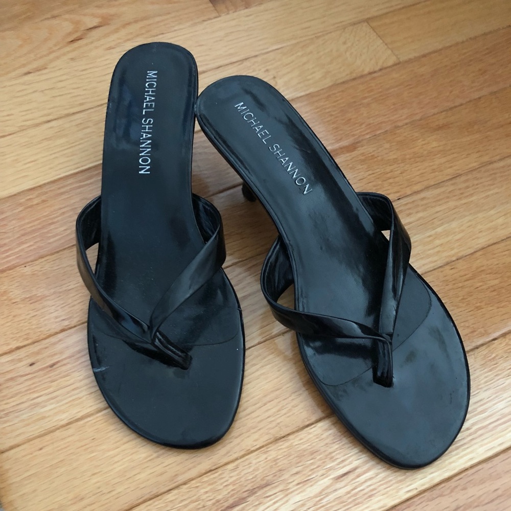 Black flip flops with a little heel